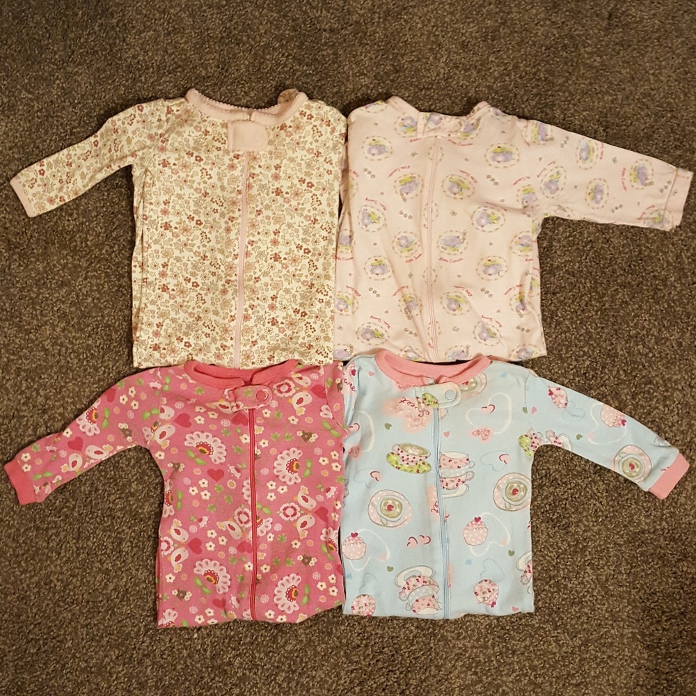 Four 6-9 months Onesies